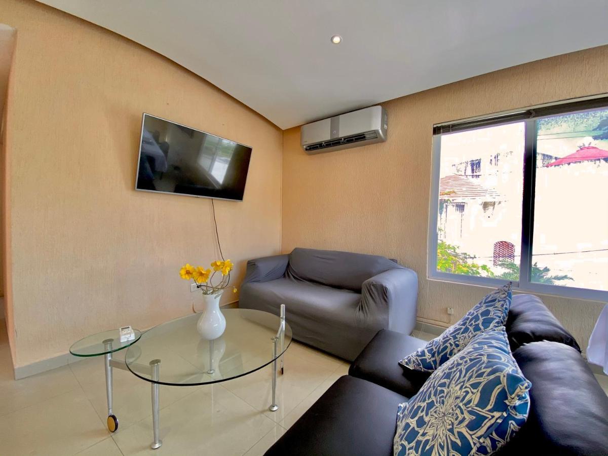 Apartamento cálido y moderno en la entrada de la zona hotelera Cancún Kültér fotó